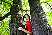 Boy Climbing Tree