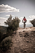 Mountain biker on rocky path. Bonniville Shoreline Trail, Corner Canyon