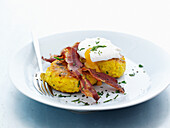 Plate of risotto cakes, eggs and bacon. RisottoCakes