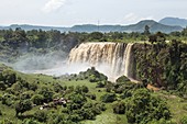 The waterfalls of the Blue Nile called Tis Isat in Ethiopia towards the end of the rainy season  Around rainy season Tis Isat translated water that smokes are considered to be the second largest waterfalls in Africa  A bit after Lake Tana the blue nile po