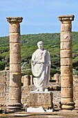 Roman ruins of Baelo Claudia, at Bolonia, Cadiz Province, Spain  Statue of the Emperor Trajan in the Forum