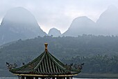 Typical Chinese pavilion on the banks of the River Li at sunrise, Yangshuo, Guangxi, China.
