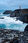 Butt of Lewis lighthouse on cliffs above stormy sea, Butt of Lewis, Isle of Lewis, Western Isles, Scotland