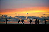 Football game with midnight sunset, Iceland