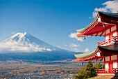 Pagoda overlooking Mount Fuji and Fujiyoshida city, Japan