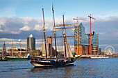 Sailing ship in front of Hafen City and Elbphilharmonie, Hamburg, Germany, Europe