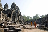 Asia, Cambodia, Siem Reap ,  Angkor Thom , Bayon Temple, with 3 monks