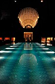 Asia, Southeast Asia, Singapore, pool at night in the Ritz-Carlton Millenia hotel
