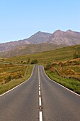 Wales,Gwynedd,Snowdonia National Park,Empty Road with Mount Snowdon in Background