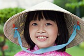 Vietnam,Vietnam,Ho Chi Minh City,Girl Dressed in Traditional Vietnamese Costume