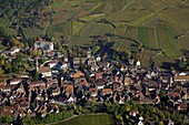 France, Haut-Rhin (68), Ribeauvillé, picturesque town of Alsace, picturesque houses and belfry, a town on the Wine Route of Alsace, (aerial view)
