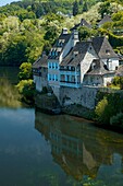 France, Correze (19), Argentat, located on the banks of the Dordogne with its traditional houses and mushrooms wooden gallery