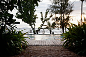 A view of the infinity pool and Gulf of Thailand at Knai Bang Chatt Hotel., Kep, Cambodia/Infinity Pool Resort