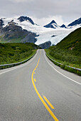 Richardson Highway Alaska winding its way up to Thompson Pass and the Worthington Glacier at the head of the valley., Richardson Highway Alaska