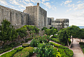 A garden with clipped hedges and paths, outside the old city walls in Dubrovnik. Historic medieval walled port, and defensive position on the Adriatic coast, and a UNESCO world heritage site., Dubrovnik, Croatia