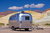 Silvery Airstream mobile home in the desert, Death Valley National Park, California, USA, America