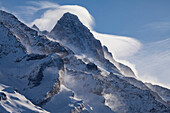 Strong winds form the typical Foehn cloud around the top of Schreckhorn, Grindelwald, Jungfrauregion, Bernese Oberland, Canton Bern, Switzerland, Europe