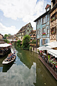Restaurant and cafe along the canal in Petite Venise, Colmar, Alsace, France
