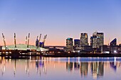 O2 Arena and Canary Wharf seen from Royal Victoria Dock, London Docklands, London, UK, Europe