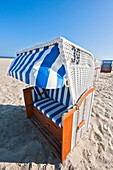 beach , beach chair , coast , coastline , Color image , deserted , East Frisia , empty , Germany , Lower Saxony , outdoor , shore , shoreline , Spiekeroog , vertical , wicker chair , V04-1497199 , AGEFOTOSTOCK 