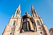 Statue in front of the church Saints-Pierre-et-Paul in Obernai, Alsace, France, Europe