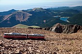 Colorado Springs, Colorado - The Manitou and Pikes Peak Railway near the summit of Pikes Peak  The cog railway takes tourists to the top of the 14,100-foot mountain