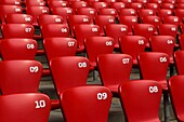 Red chairs at a stadium
