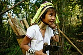 Longneck girl carrying firewood and a hatchet Approximately 300 Burmese refugees in Thailand are members of the indigenous group known as the Longnecks The largest of the three villages where the Longnecks live is called Nai Soi, located near Mae Hong Son