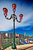 Street light overlooking the Grand Canal, opposite San Marco sestiere, Dorsoduro, Venice, Italy