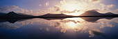 Morven Range reflected in Lochan, Flow Country, Caithness, Scottish Highlands, Scotland