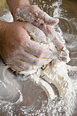 Kneading flour and egg to make a dough, baking, Homemade