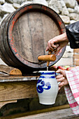 Apple apple cider in a wooden barrel, Homemade, Bavaria, Germany