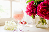 Sparkling wine with elderflower blossom and strawberries, Homemade, Bavaria, Germany