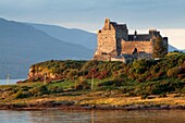 Duart Castle at sunset in Isle of Mull, Argyll and Bute, Scotland