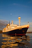 The Lindblad Expedition ship National Geographic Endeavour at sunrise operating in the Galapagos Islands, Ecuador. The Lindblad Expedition ship National Geographic Endeavour at sunrise operating in the Galapagos Islands, Ecuador  MORE INFO Lindblad Expedi