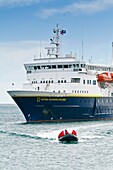 The Lindblad Expedition Ship National Geographic Explorer shown here at the Shackleton waterfall at Stromness Bay on South Georgia Island, Southern Ocean. The Lindblad Expedition Ship National Geographic Explorer shown here at the Shackleton waterfall at 