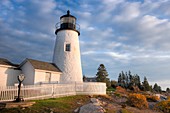 Pemaquid Point Lighthouse in warm light just after sunrise, Bristol, Maine, USA