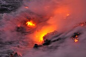 Steam rising off lava flowing into ocean, Kilauea Volcano, Big Island, Hawaii Islands, Usa