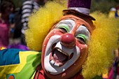 A clown laughs during the 16th International Clown Convention: The Laughter Fair organized by the Latino Clown Brotherhood, in Mexico City, October 17, 2011