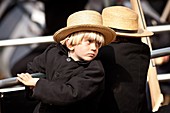 Amish boy during the Annual Mud Sale to support the Fire Department in Gordonville, PA