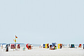 Colorful beach chairs, sandbank near Norddorf, Amrum, North Frisian Islands, Schleswig-Holstein, Germany