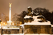 Angel of peace behind Pfalz Statue and Luitpold bridge, at night and snowdrift, Munich, Upper Bavaria, Bavaria, Germany
