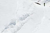 Skitourengeherin beim Aufstieg zur Scheichenspitze, Ramsau, Dachsteingebirge, Steiermark, Österreich