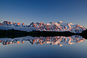 Mont Blanc range reflecting in a mountain lake, Mont blanc range, Chamonix, Savoy, France