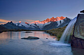 Mischabel range with Allalinhorn, Alphubel, Täschhorn, Dom and Lenzspitze reflecting in a mountain lake, Pennine Alps, Valais, Switzerland