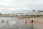 People on the beach of Llandudno seaside resort, North Wales, Great Britain, Europe