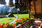 Cowbells on the balcony of a Hotel, Gastern Valley, Bernese Oberland, Canton of Bern, Switzerland