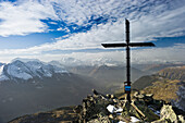 Summit cross of Bettmerhorn, Bettmeralp, In the background Pennine Alps and Rhone Valley, Canton of Valais, Switzerland, Europe