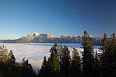 View over the fog in the valley to Hoher Goell and Hohes Brett in the moonlight, Berchtesgaden region, Berchtesgaden National Park, Upper Bavaria, Germany, Europe