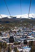 USA, Colorado, Breckenridge, ski lift gondolas and Mount Baldy
